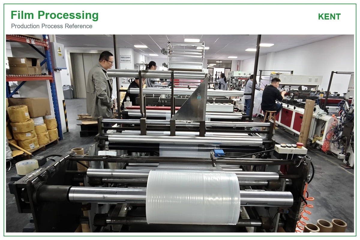 Film passing through guide rollers on processing equipment.webp